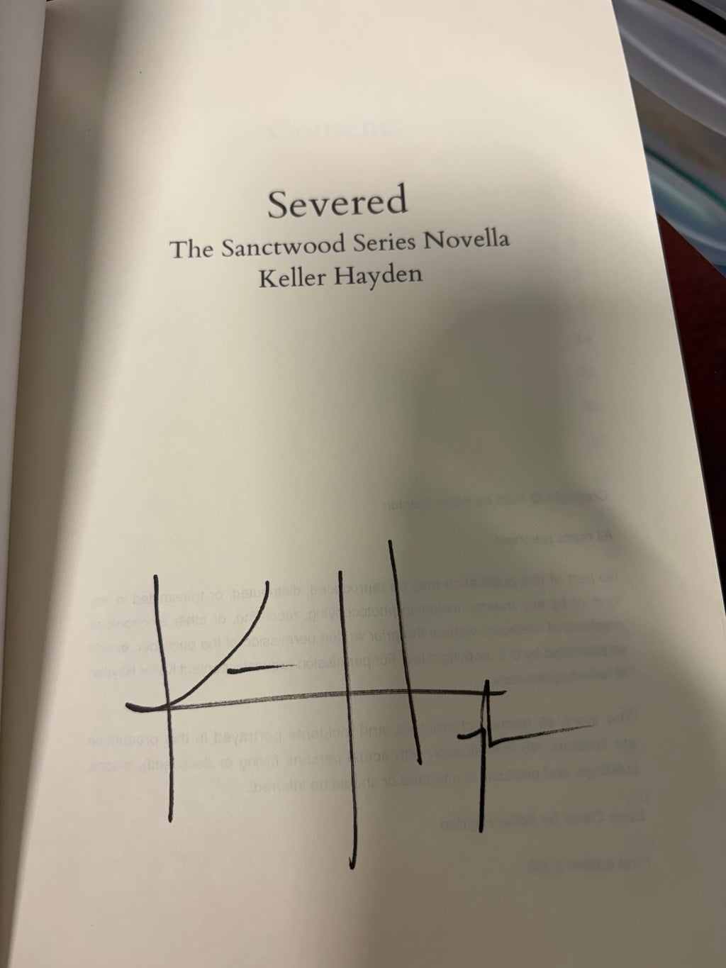 Severed *signed*