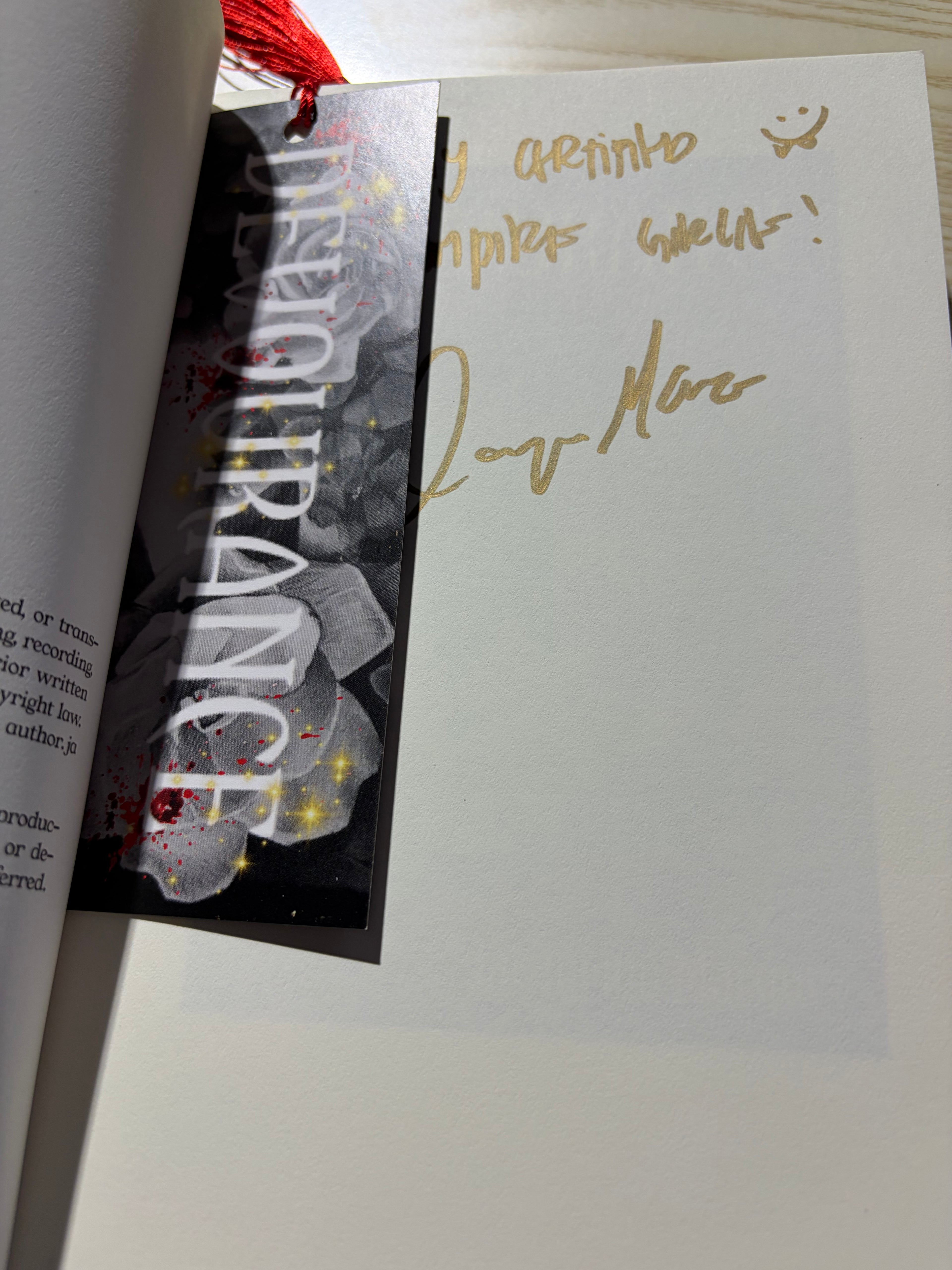 Devourance *signed with bookmark*
