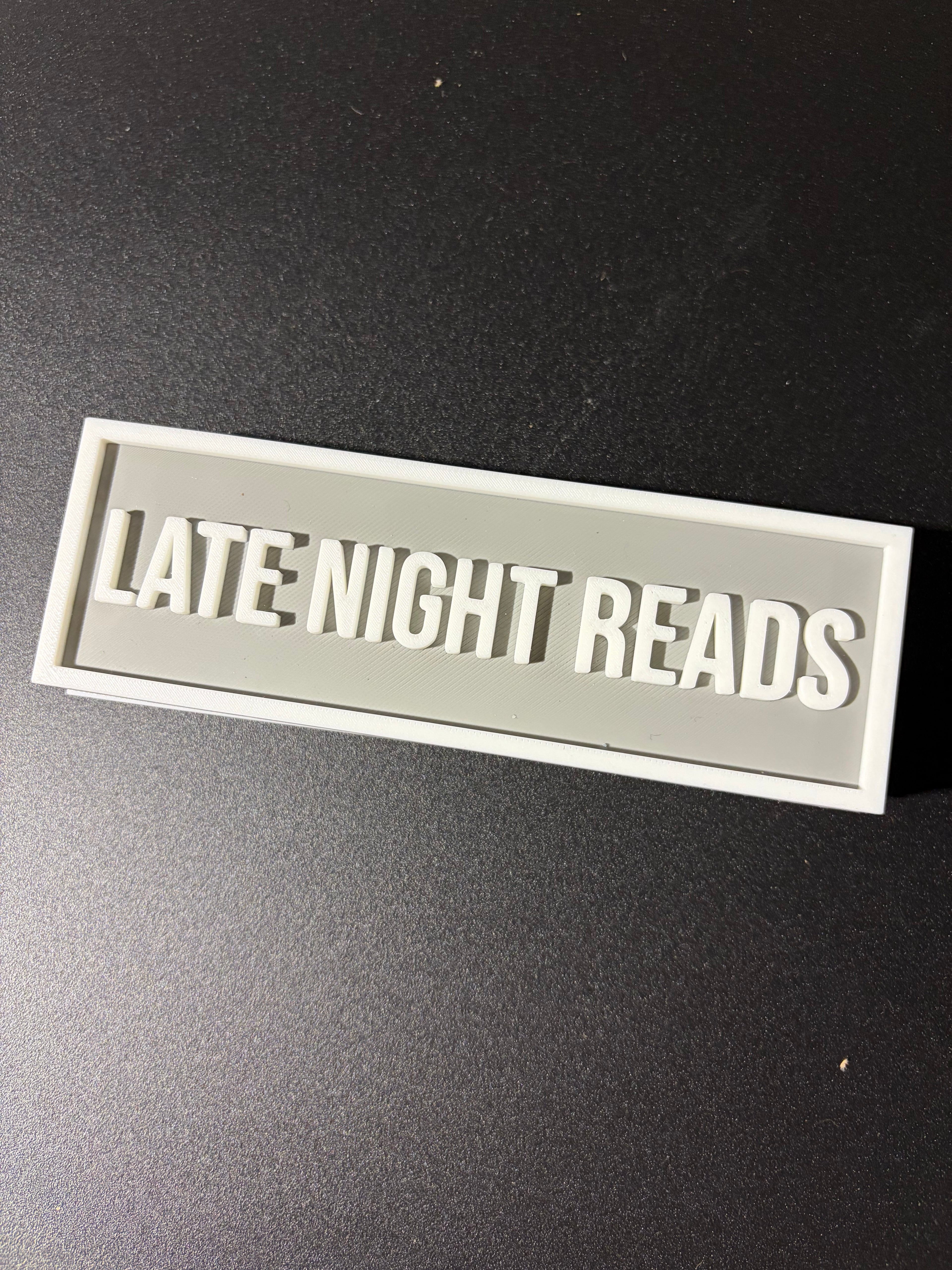 Late Night Reads sign